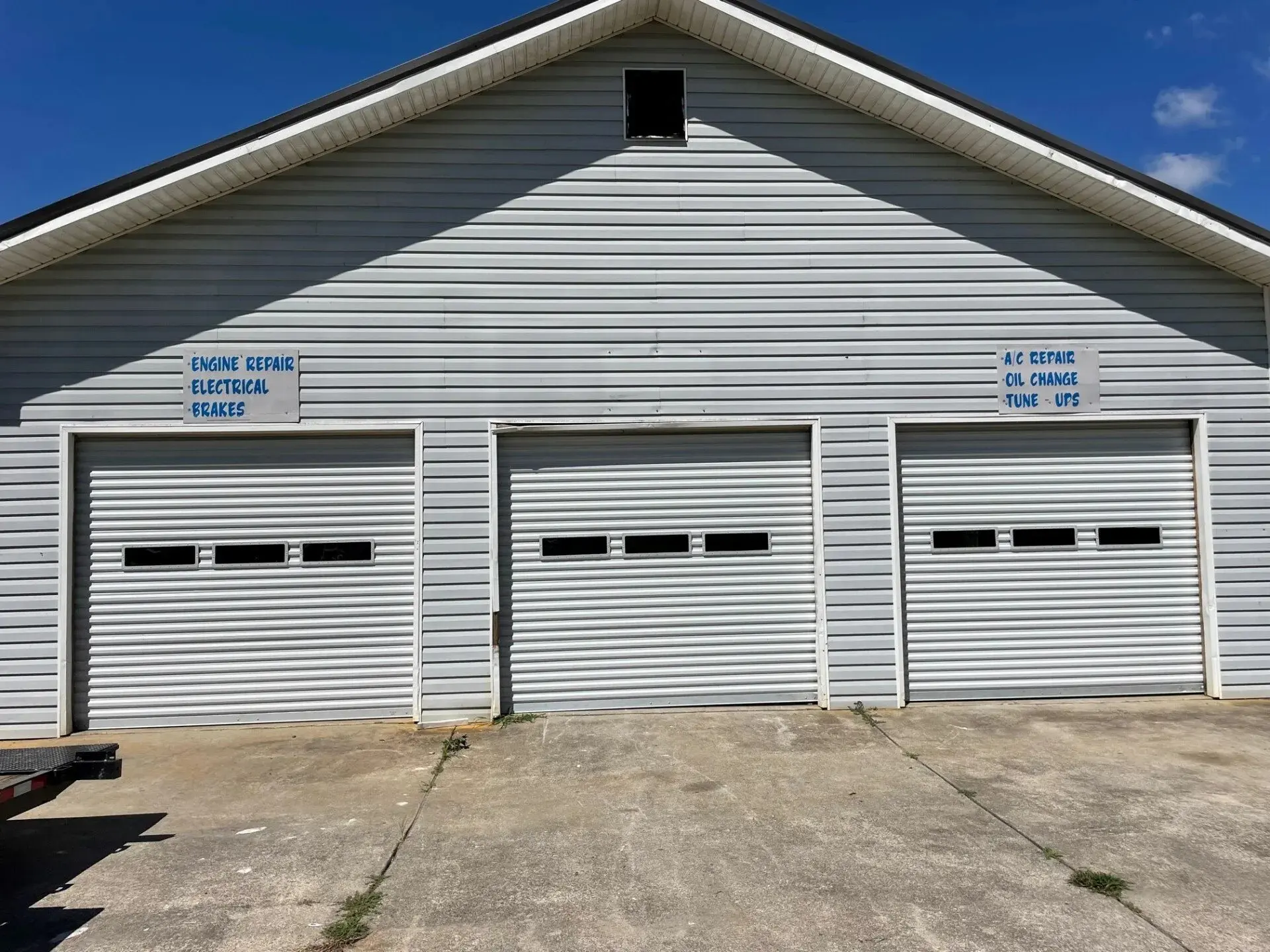 three garage doors repair service